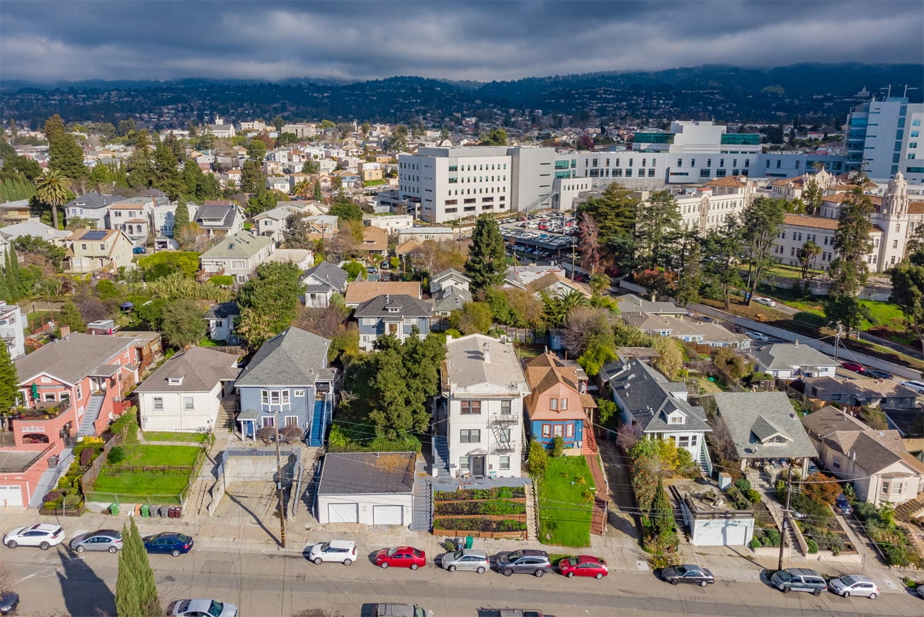 high-sky-view-of-the-city-with-streets-cars-and-hills